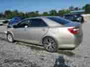 2014 Toyota Camry LE with VIN 4T1BD1FK8EU106252, listed as a Copart auction lot 68969405 with 256,940 mi miles and Salvage title. Bid and sale history available at DreamBid. Image 2.