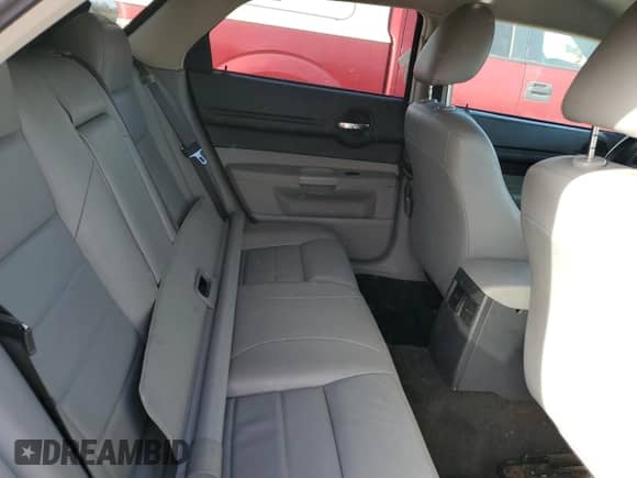 2006 Dodge Magnum with VIN 2D8FV47V46H148226, listed as a Copart auction lot 77026524 with 80,155 mi miles and Salvage title. Bid and sale history available at DreamBid. Image 10.