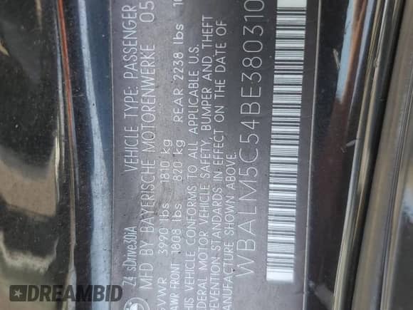 2011 BMW Z4 sDrive30i with VIN WBALM5C54BE380310, listed as a Copart auction lot 66305635 with 108,897 mi miles and Salvage title. Bid and sale history available at DreamBid. Image 12.