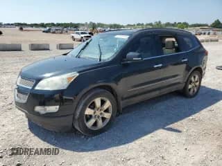 2012 Chevrolet Traverse LTZ с VIN 1GNKVLED5CJ122186, выставлен на аукционе Copart как лот 67210645 с пробегом 288 038 миль миль и Списание • Salvage title. История ставок и продаж доступна на DreamBid. Изображение 1.
