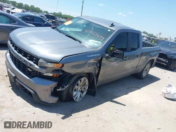 2021 Chevrolet Silverado 1500 Custom with VIN 1GCRWBEKXMZ305390, listed as a IAAI auction lot 42527499 with 119,325 mi miles and . Bid and sale history available at DreamBid. Image 2.