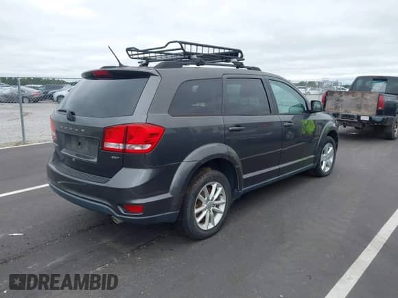 2014 Dodge Journey SXT with VIN 3C4PDDBG6ET141105, listed as a IAAI auction lot 43443646 with 164,188 mi miles and . Bid and sale history available at DreamBid. Image 4.