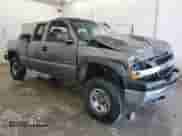 2002 Chevrolet Silverado 2500HD LS с VIN 1GCHK29G32E208114, выставлен на аукционе Copart как лот 61581645 с пробегом 165 577 миль миль и На запчасти • Non repairable. История ставок и продаж доступна на DreamBid. Изображение 4.