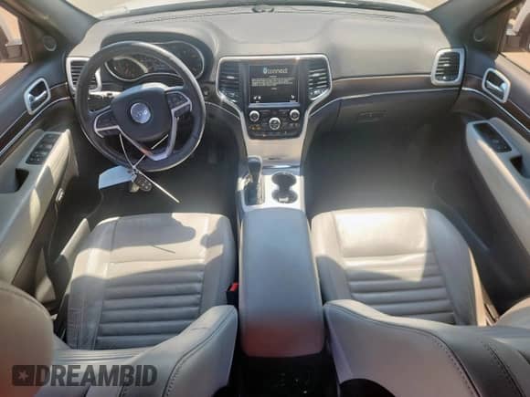 2018 Jeep Grand Cherokee Sterling with VIN 1C4RJFBT6JC184911, listed as a Copart auction lot 71200455 with 50,937 mi miles and Salvage title. Bid and sale history available at DreamBid. Image 8.