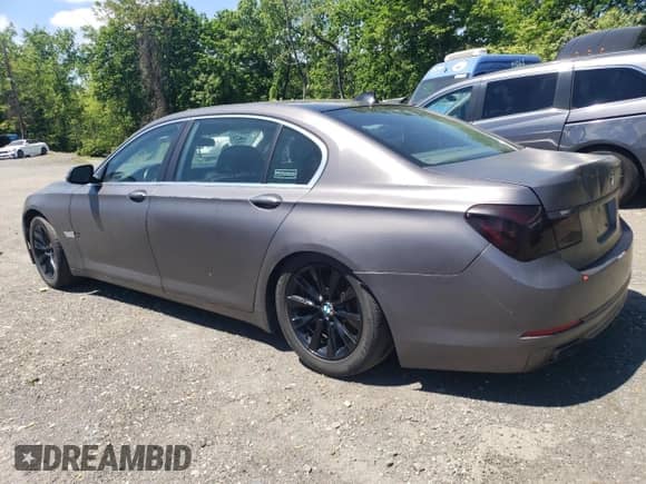 2013 BMW 7 Series 740Li xDrive with VIN WBAYF4C55DDE23588, listed as a Copart auction lot 57968395 with 53,166 mi miles and Salvage title. Bid and sale history available at DreamBid. Image 2.