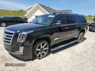 2015 Cadillac Escalade ESV Premium with VIN 1GYS4TKJ6FR677055, listed as a Copart auction lot 64568965 with Not provided miles and Salvage title. Bid and sale history available at DreamBid. Image 1.