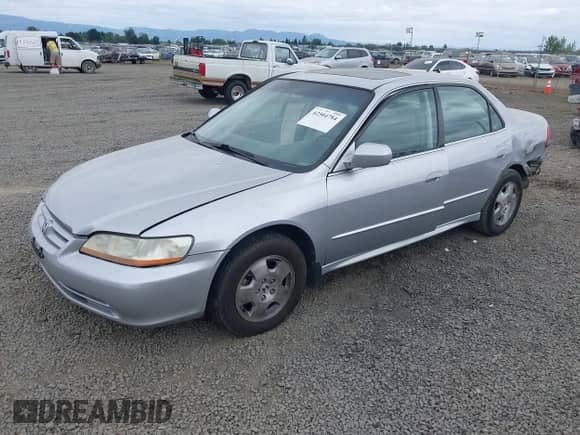2002 Honda Accord EX with VIN 1HGCG165X2A039503, listed as a IAAI auction lot 42504784 with 201,995 mi miles and . Bid and sale history available at DreamBid. Image 2.