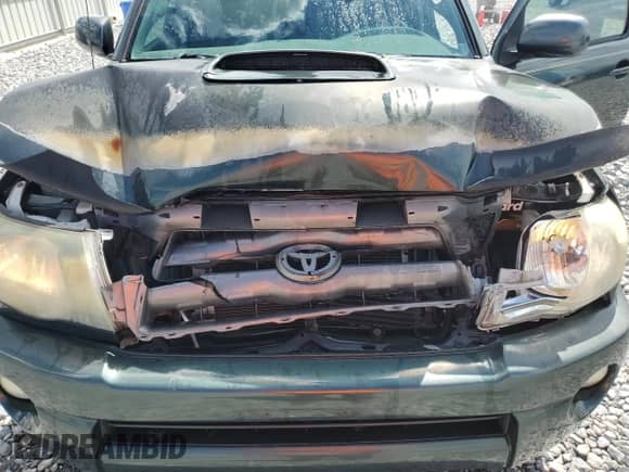 2010 Toyota Tacoma PreRunner z VIN 5TEJU4GN7AZ708023, wystawiony jako Copart lot #84866105 z przebiegiem 195 283 mil mil oraz Szkoda całkowita • Salvage title. Historia ofert i sprzedaży dostępna na DreamBid. Obrazek 11.