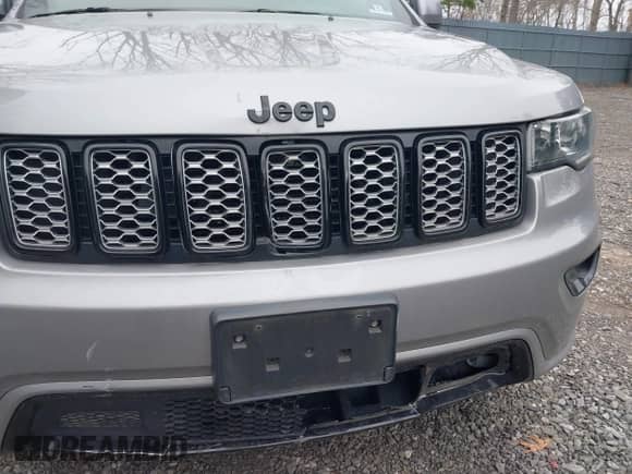 2019 Jeep Grand Cherokee Laredo E with VIN 1C4RJFAG7KC853886, listed as a IAAI auction lot 42013214 with 84,836 mi miles and . Bid and sale history available at DreamBid. Image 6.