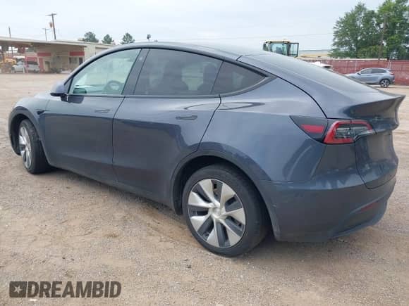 2021 Tesla Model Y Long Range with VIN 5YJYGDEE1MF217624, listed as a IAAI auction lot 42842945 with 58,610 mi miles and . Bid and sale history available at DreamBid. Image 3.