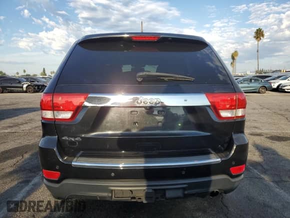2012 Jeep Grand Cherokee Overland z VIN 1C4RJFCG2CC252898, wystawiony jako Copart lot #80726185 z przebiegiem 91 276 mil mil oraz Szkoda całkowita • Salvage title. Historia ofert i sprzedaży dostępna na DreamBid. Obrazek 6.