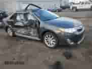 2012 Toyota Camry XLE with VIN 4T1BK1FK3CU009432, listed as a Copart auction lot 84786985 with 266,004 mi miles and Clean title. Bid and sale history available at DreamBid. Image 4.