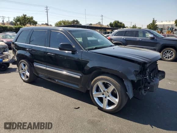 2007 Jeep Grand Cherokee SRT-8 с VIN 1J8HR78377C631328, выставлен на аукционе Copart как лот 70689995 с пробегом 182 767 миль миль и Списание • Salvage title. История ставок и продаж доступна на DreamBid. Изображение 4.