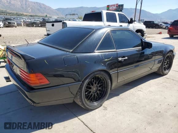 1992 Mercedes-Benz SL с VIN WDBFA66E2NF060135, выставлен на аукционе Copart как лот 71704754 с пробегом 118 204 миль миль и Списание • Salvage title. История ставок и продаж доступна на DreamBid. Изображение 3.