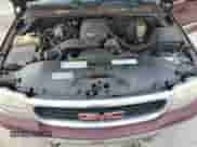 2001 GMC Sierra 1500 SLE z VIN 2GTEC19TX11273016, wystawiony jako Copart lot #71158645 z przebiegiem 306 098 mil mil oraz Szkoda całkowita • Salvage title. Historia ofert i sprzedaży dostępna na DreamBid. Obrazek 11.