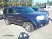 2009 Honda Pilot Touring with VIN 5FNYF489X9B007452, listed as a IAAI auction lot 43262557 with 206,355 mi miles and . Bid and sale history available at DreamBid. Image 1.