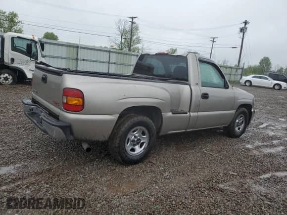 2001 GMC Sierra 1500 SL with VIN 1GTEC14W51Z238201, listed as a Copart auction lot 58315405 with 128,621 mi miles and Salvage title. Bid and sale history available at DreamBid. Image 3.