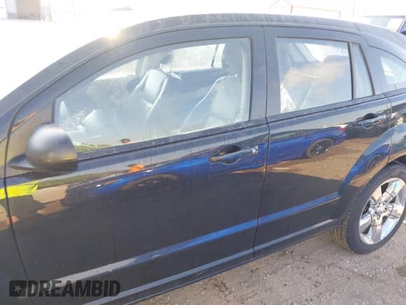 2011 Dodge Caliber Uptown with VIN 1B3CB9HB2BD172349, listed as a IAAI auction lot 42901430 with 141,201 mi miles and . Bid and sale history available at DreamBid. Image 14.