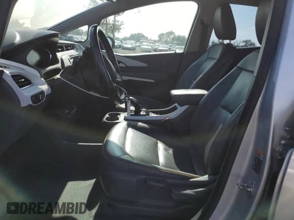 2017 Chevrolet Bolt EV Premier с VIN 1G1FX6S06H4190373, выставлен на аукционе Copart как лот 82728885 с пробегом 147 779 миль миль и Списание • Salvage title. История ставок и продаж доступна на DreamBid. Изображение 7.