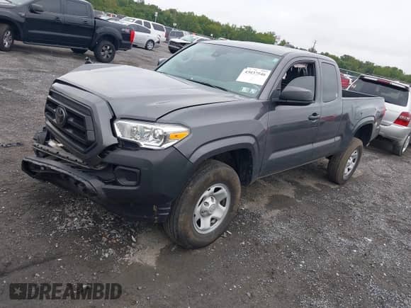 2023 Toyota Tacoma SR with VIN 3TYSX5EN6PT021792, listed as a IAAI auction lot 43037546 with 20,673 mi miles and . Bid and sale history available at DreamBid. Image 2.