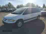 2000 Dodge Caravan SE with VIN 1B4GP44L3YB734876, listed as a Copart auction lot 72469374 with 215,240 mi miles and Salvage title. Bid and sale history available at DreamBid. Image 1.