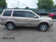 2006 Honda Pilot EX-L z VIN 5FNYF28756B008300, wystawiony jako IAAI lot #42543571 z przebiegiem 175 273 mil mil oraz . Historia ofert i sprzedaży dostępna na DreamBid. Obrazek 6.