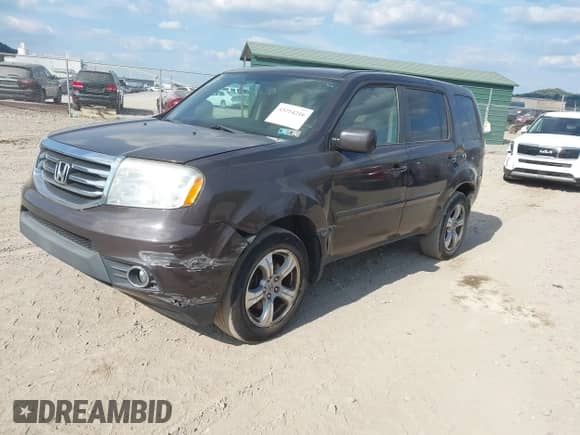 2014 Honda Pilot EX-L with VIN 5FNYF4H52EB015665, listed as a IAAI auction lot 43214216 with 140,041 mi miles and . Bid and sale history available at DreamBid. Image 17.