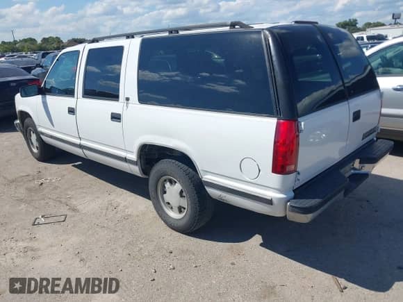 1999 Chevrolet Suburban z VIN 3GNEC16R8XG124569, wystawiony jako IAAI lot #43317248 z przebiegiem 254 826 mil mil oraz . Historia ofert i sprzedaży dostępna na DreamBid. Obrazek 3.