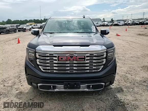 2023 GMC Sierra 1500 Denali z VIN 3GTUUGED9PG208796, wystawiony jako Copart lot #66319535 z przebiegiem 64 409 mil mil oraz Szkoda całkowita • Salvage title. Historia ofert i sprzedaży dostępna na DreamBid. Obrazek 13.