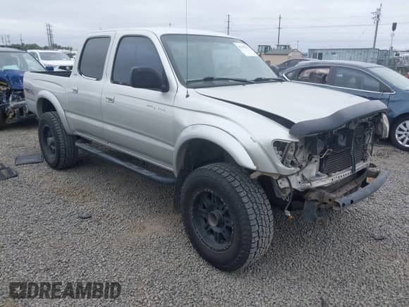 2002 Toyota Tacoma z VIN 5TEHN72N82Z039668, wystawiony jako IAAI lot #43247572 z przebiegiem 241 336 mil mil oraz . Historia ofert i sprzedaży dostępna na DreamBid. Obrazek 1.