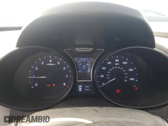 2013 Hyundai Veloster Turbo с VIN KMHTC6AE7DU173199, выставлен на аукционе Copart как лот 81507235 с пробегом 134 071 миль миль и Списание • Salvage title. История ставок и продаж доступна на DreamBid. Изображение 9.