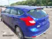 2014 Ford Focus Titanium z VIN 1FADP3N2XEL221125, wystawiony jako IAAI lot #43258398 z przebiegiem 165 585 mil mil oraz . Historia ofert i sprzedaży dostępna na DreamBid. Obrazek 3.