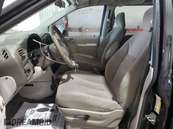 2007 Dodge Caravan SE with VIN 1D8GP24R97B242817, listed as a Copart auction lot 66479355 with 198,079 mi miles and Salvage title. Bid and sale history available at DreamBid. Image 7.