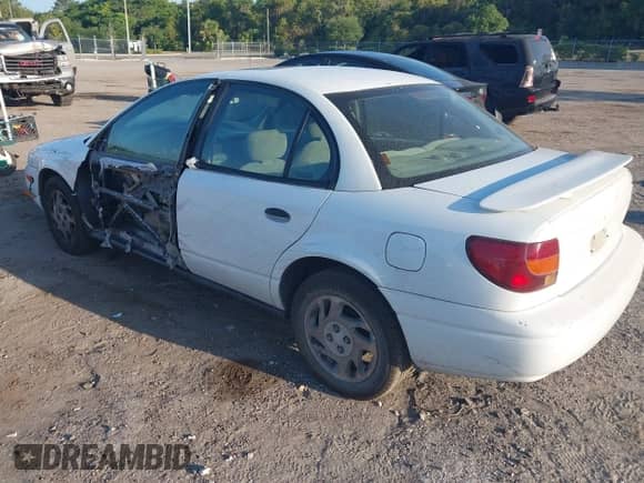 2002 Saturn SL with VIN 1G8ZF52872Z258630, listed as a IAAI auction lot 42136196 with 205,914 mi miles and . Bid and sale history available at DreamBid. Image 3.