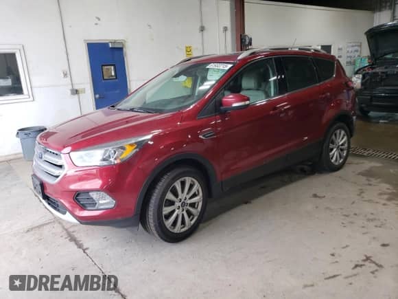 2017 Ford Escape Titanium with VIN 1FMCU9J92HUB62618, listed as a Copart auction lot 61932215 with 122,189 mi miles and Salvage title. Bid and sale history available at DreamBid. Image 1.