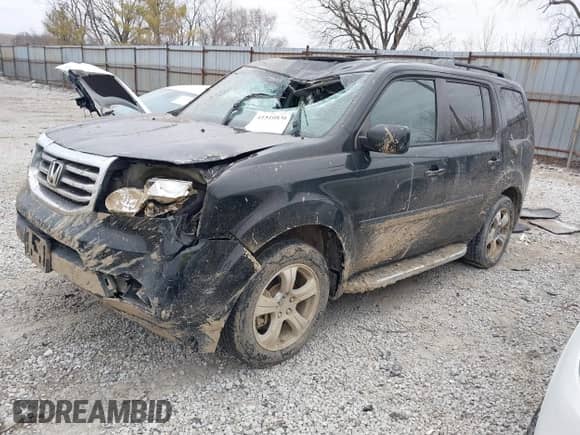 2013 Honda Pilot EX-L with VIN 5FNYF4H70DB013445, listed as a IAAI auction lot 41510836 with 292,896 mi miles and . Bid and sale history available at DreamBid. Image 2.
