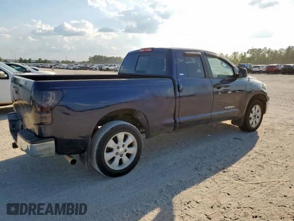 2010 Toyota Tundra с VIN 5TFRM5F1XAX011623, выставлен на аукционе Copart как лот 82263905 с пробегом 230 936 миль миль и Чистый • Clean title. История ставок и продаж доступна на DreamBid. Изображение 3.
