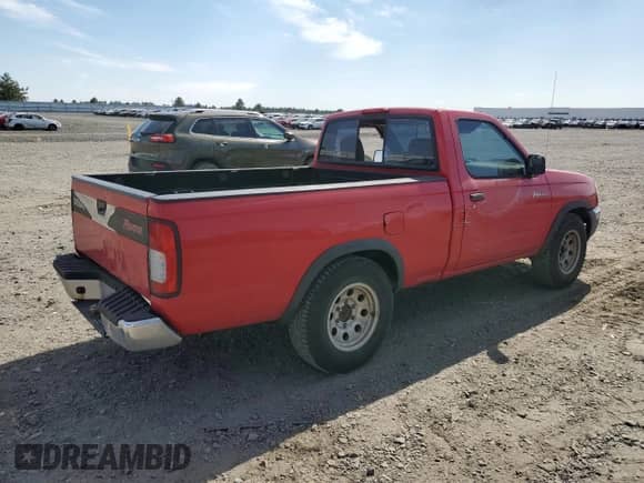 1998 Nissan Frontier XE z VIN 1N6DD21S2WC364538, wystawiony jako Copart lot #62867545 z przebiegiem 261 987 mil mil oraz Szkoda całkowita • Salvage title. Historia ofert i sprzedaży dostępna na DreamBid. Obrazek 3.