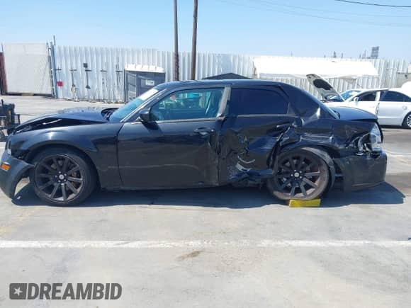 2006 Chrysler 300 C SRT-8 with VIN 2C3LA73W86H518966, listed as a IAAI auction lot 42725107 with 175,474 mi miles and . Bid and sale history available at DreamBid. Image 15.