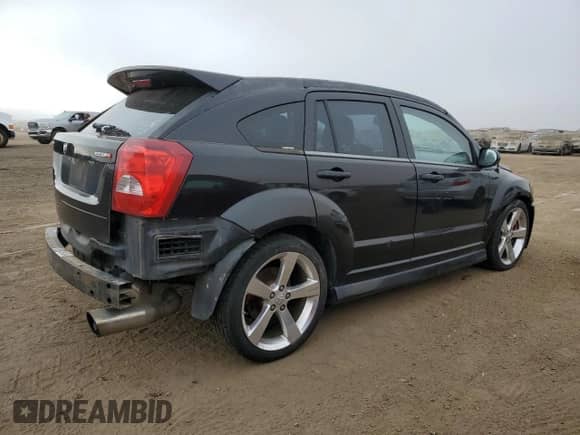 2008 Dodge Caliber с VIN 1B3HB68F48D610000, выставлен на аукционе Copart как лот 85920834 с пробегом 104 306 миль миль и Списание • Salvage title. История ставок и продаж доступна на DreamBid. Изображение 3.