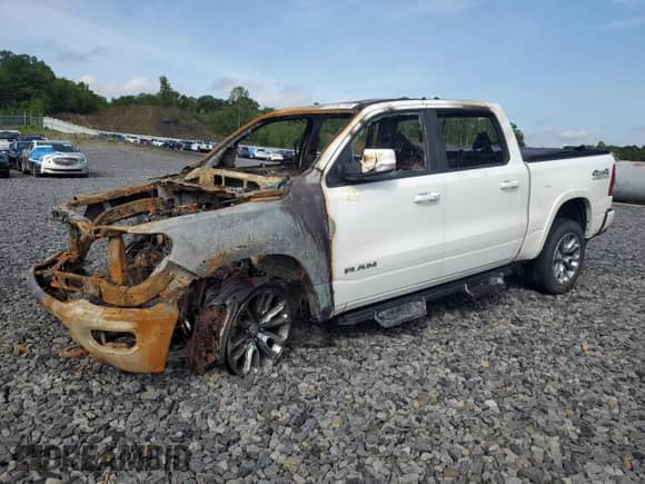 2020 Ram 1500 Laramie with VIN 1C6SRFJM9LN213594, listed as a Copart auction lot 61912715 with Not provided miles and Salvage title. Bid and sale history available at DreamBid. Image 1.