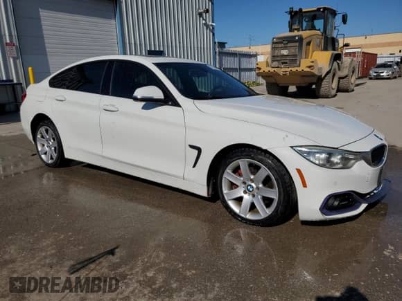 2015 BMW 4 Series 428i xDrive z VIN WBA4A7C52FD413230, wystawiony jako Copart lot #84629505 z przebiegiem 198 023 mil mil oraz Szkoda całkowita • Salvage title. Historia ofert i sprzedaży dostępna na DreamBid. Obrazek 4.