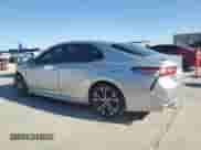 2018 Toyota Camry SE с VIN 4T1B11HK2JU002582, выставлен на аукционе Copart как лот 82613755 с пробегом 133 835 миль миль и Списание • Salvage title. История ставок и продаж доступна на DreamBid. Изображение 2.