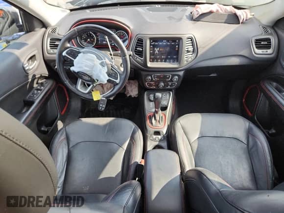 2017 Jeep Compass Trailhawk with VIN 3C4NJDDB6HT641433, listed as a Copart auction lot 65556115 with 62,150 mi miles and Salvage title. Bid and sale history available at DreamBid. Image 8.