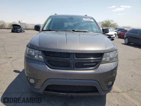 2019 Dodge Journey SE с VIN 3C4PDCBB0KT784396, выставлен на аукционе Copart как лот 68558005 с пробегом 131 186 миль миль и Списание • Salvage title. История ставок и продаж доступна на DreamBid. Изображение 5.