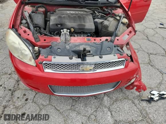 2012 Chevrolet Impala LS Retail z VIN 2G1WA5E33C1115121, wystawiony jako Copart lot #66149985 z przebiegiem 102 903 mil mil oraz Szkoda całkowita • Salvage title. Historia ofert i sprzedaży dostępna na DreamBid. Obrazek 11.