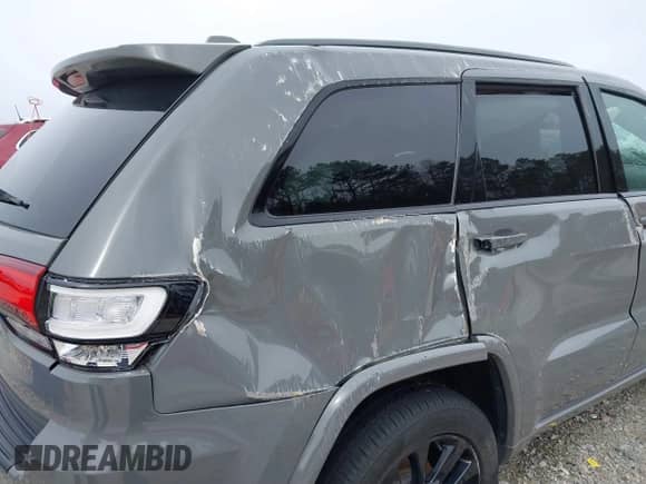 2020 Jeep Grand Cherokee Altitude with VIN 1C4RJEAG8LC244544, listed as a IAAI auction lot 41739817 with 84,075 mi miles and . Bid and sale history available at DreamBid. Image 12.