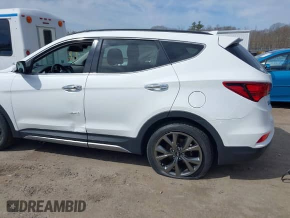 2017 Hyundai Santa Fe Ultimate с VIN 5NMZWDLA1HH050029, выставлен на аукционе IAAI как лот 39177669 с пробегом 65 392 миль миль и . История ставок и продаж доступна на DreamBid. Изображение 12.
