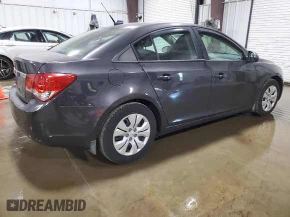 2014 Chevrolet Cruze LS with VIN 1G1PA5SG4E7123083, listed as a Copart auction lot 85870245 with 70,365 mi miles and Salvage title. Bid and sale history available at DreamBid. Image 3.