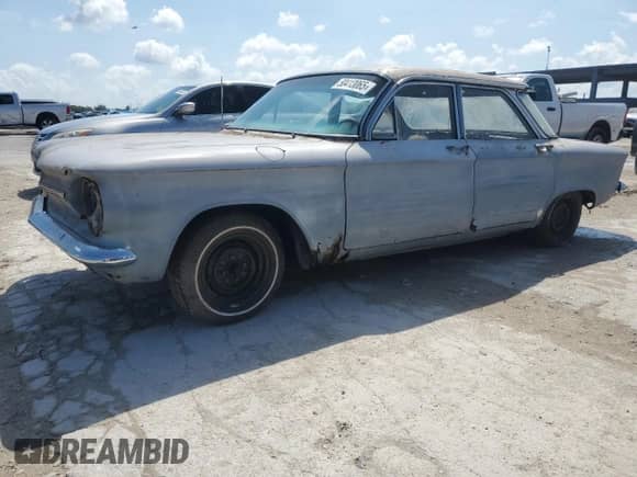 1964 Chevrolet Corvair with VIN 40969W180730, listed as a Copart auction lot 50413065 with 62,429 mi miles and Clean title. Bid and sale history available at DreamBid. Image 1.